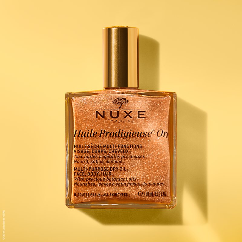 NUXE Sausasis švytėjimo suteikiantis aliejus „Huile Prodigieuse Or Shimmering® Multi-purpose dry oil“ (veidui ir kūnui puoselėti), 100 ml